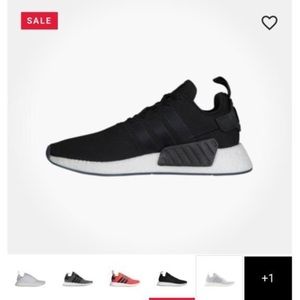 *Brand New Navy Blue Adidas NMD R2 sneakers*